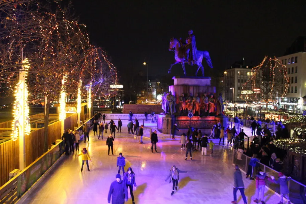 Ice skating ring in the midst of the Cologne  Christmas markets.